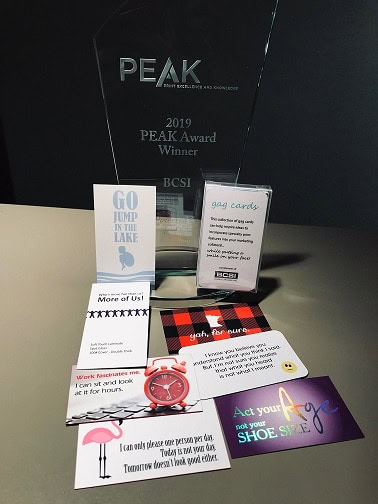 Display of Gag Cards and PEAK Award trophy from Printforce.